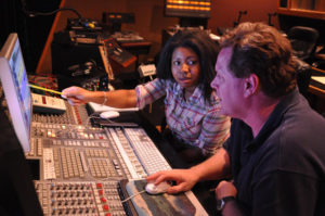 Instructor Ken Schubert working one-on-one with an engineering student